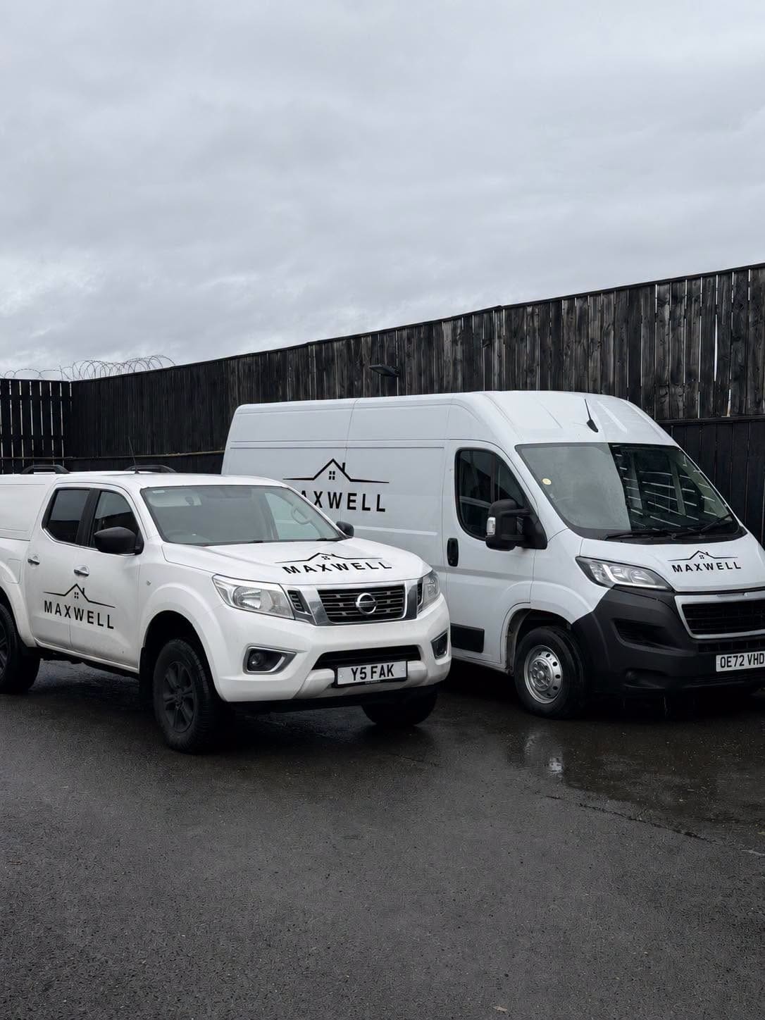 The Maxwell pickup and panel van parked side by side