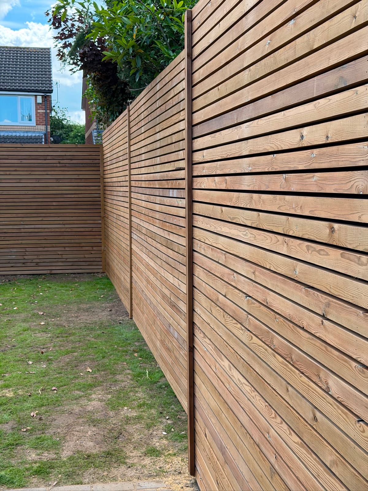 Close-up of horizontal Venetian timber slats with even spacing